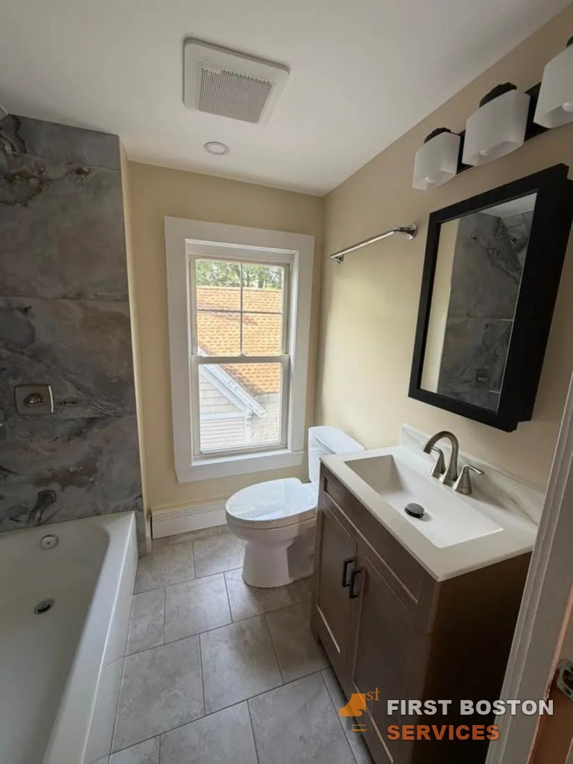 First Boston Services: Bathroom after: new tile, vanity and fixtures
