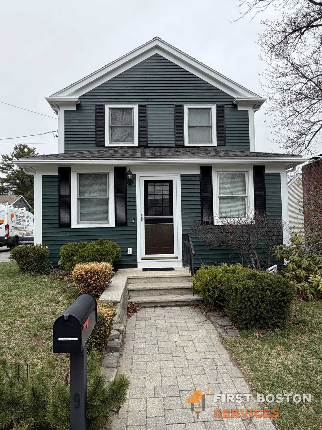 First Boston Services: Front of the house after: deep green with white trim