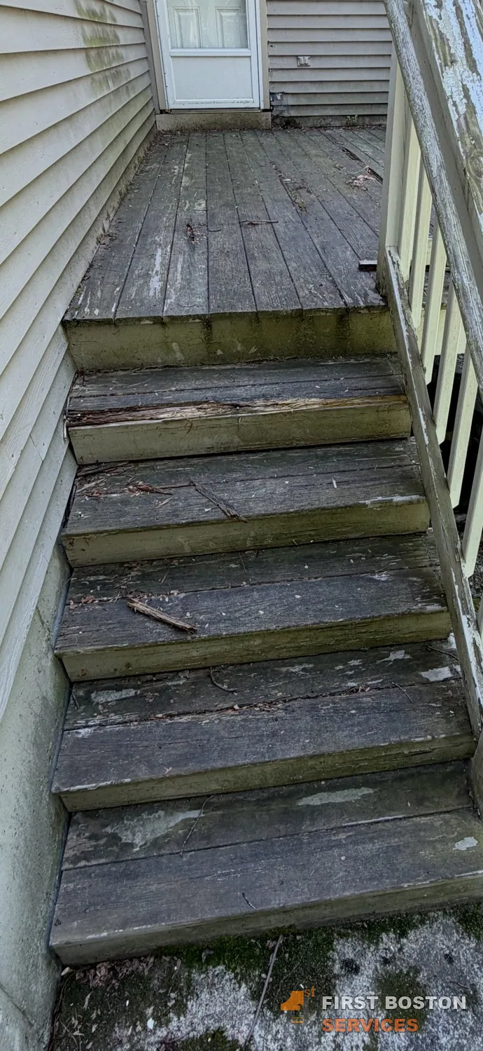 First Boston Services: Rear stairs before: worn and rotted treads