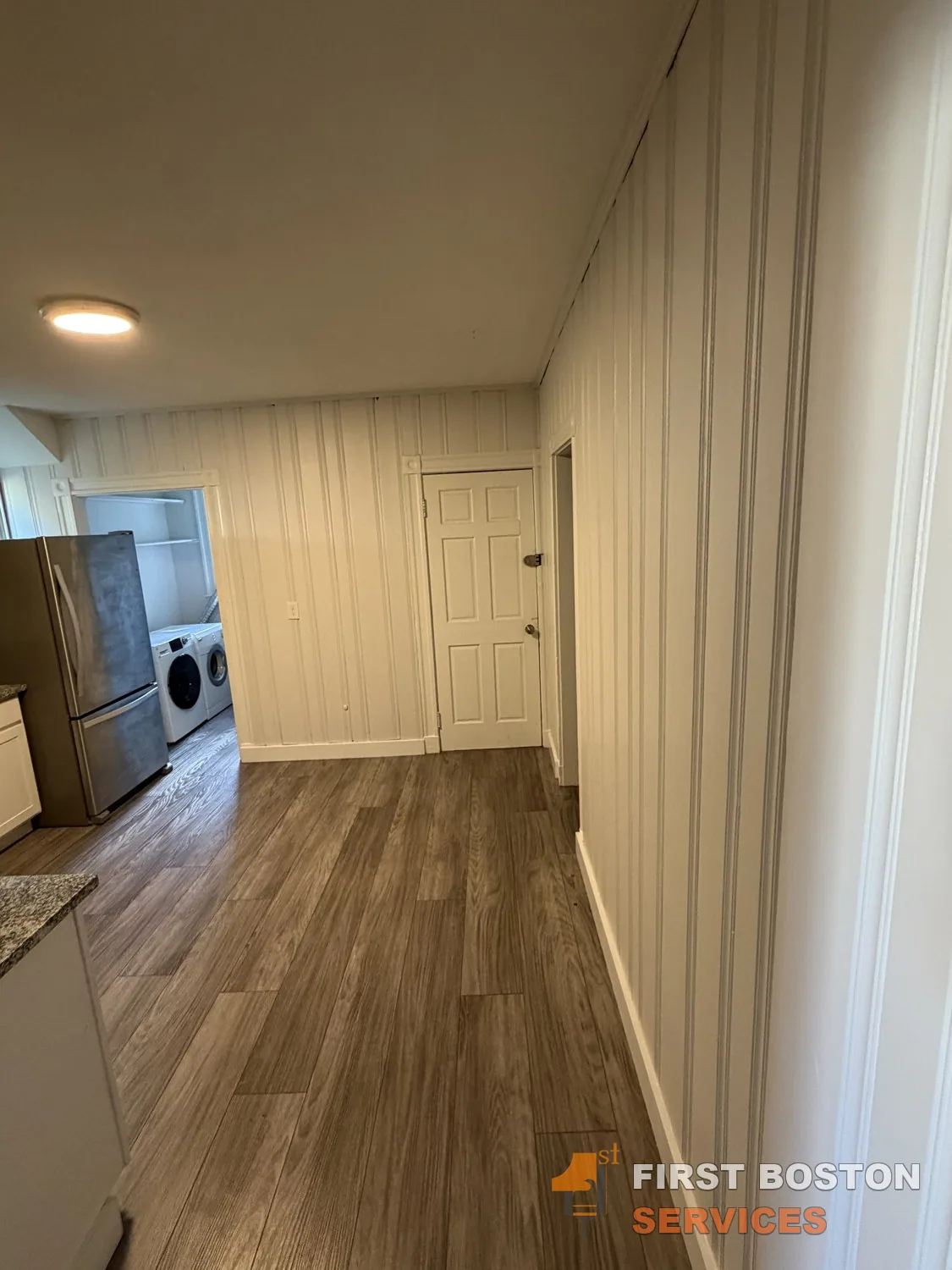 First Boston Services: Paneled hallway finished