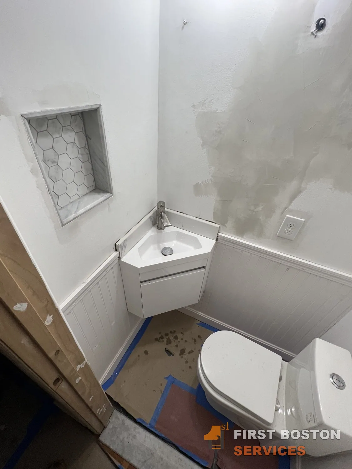 First Boston Services: Wall repairs above the wainscot